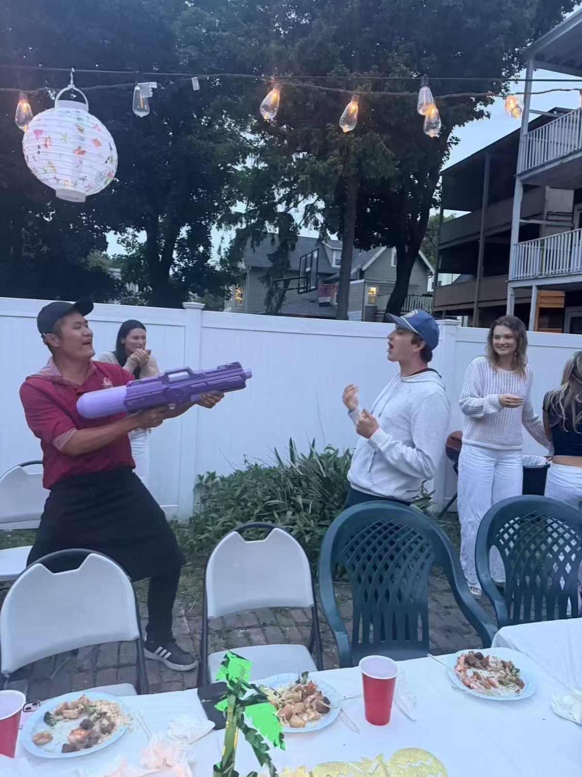 Catch the Food Hibachi chef tossing food to guests at an at-home party in CT